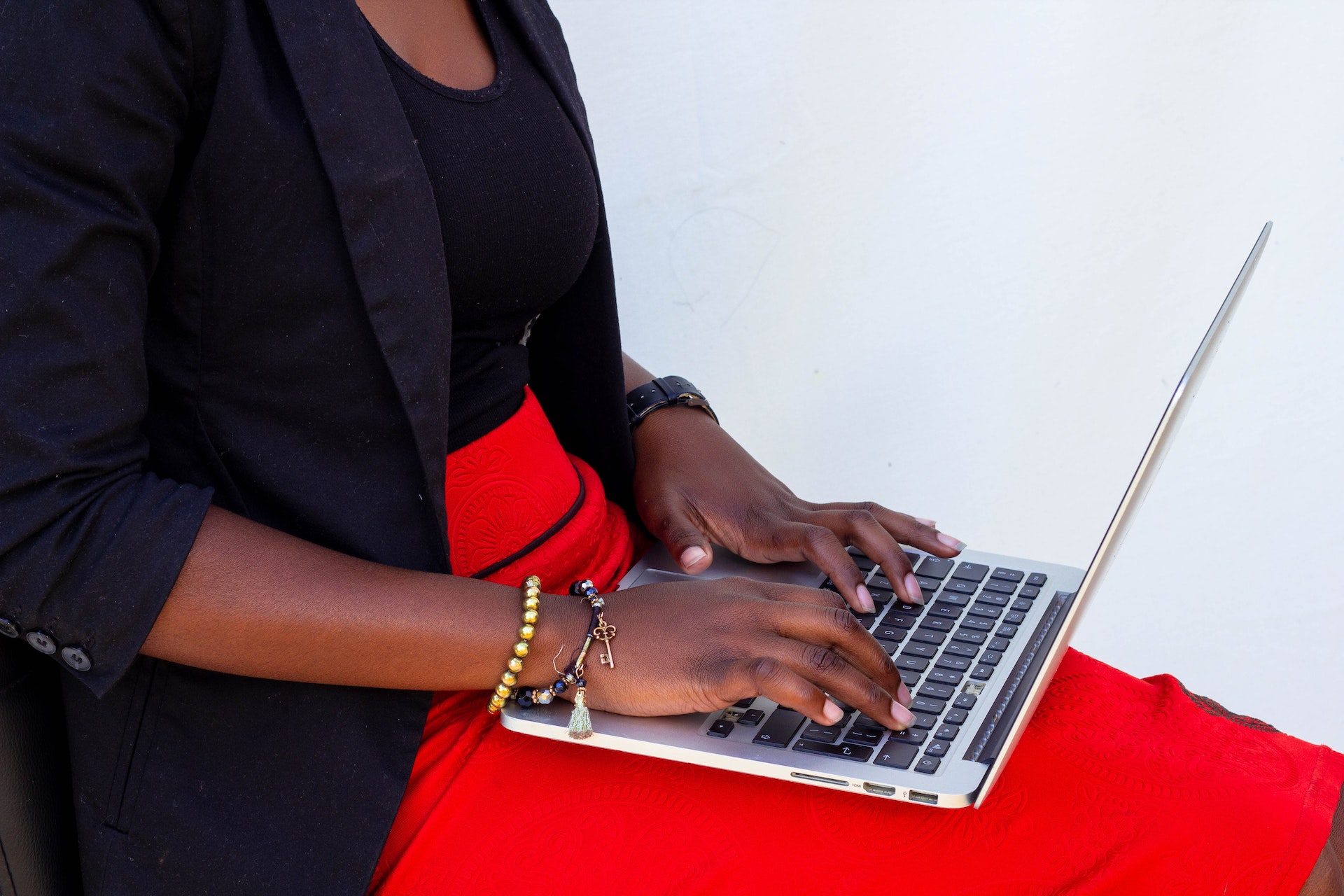 Woman typing on laptop